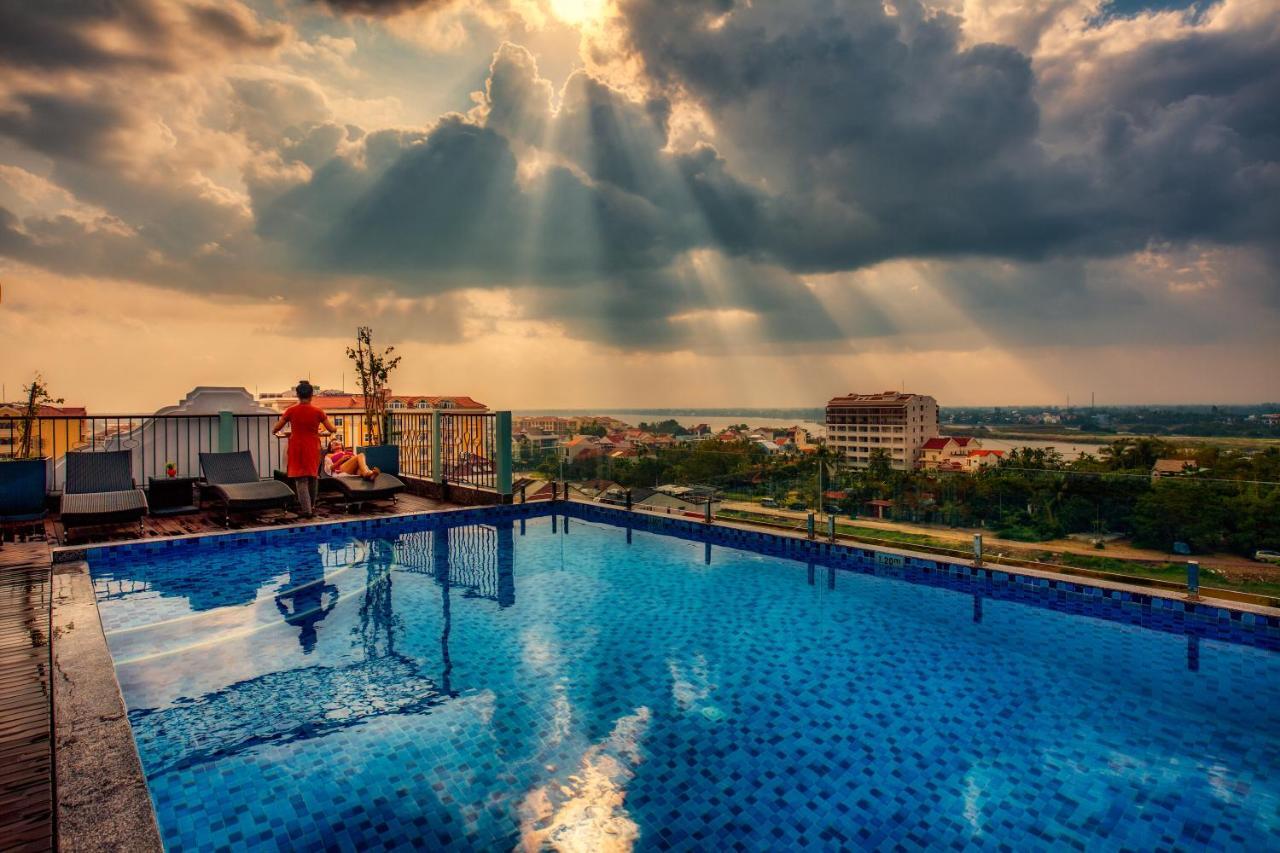Cozy Savvy Boutique Hotel Hoi An Eksteriør billede Sunset at the rooftop pool