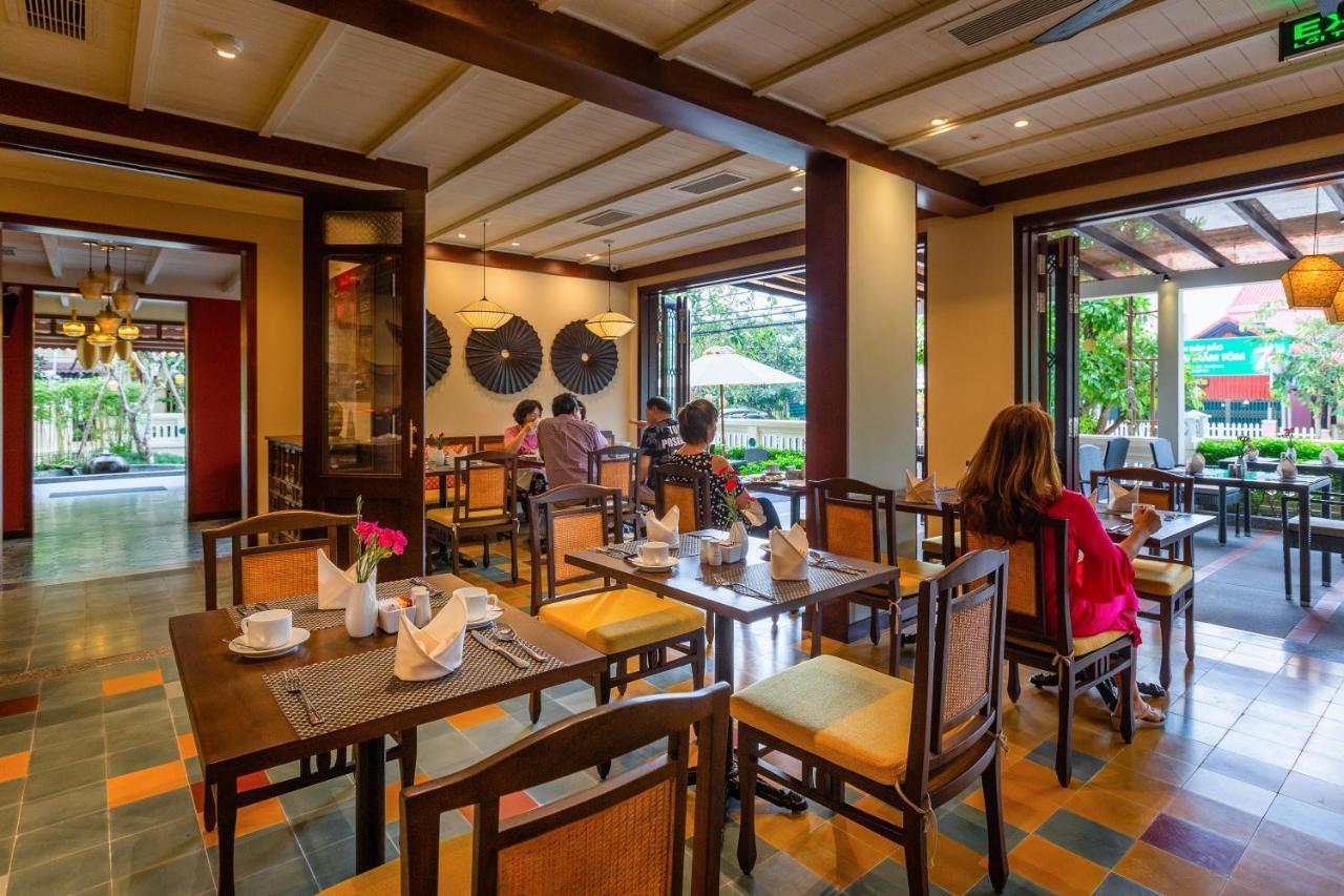 Cozy Savvy Boutique Hotel Hoi An Eksteriør billede The interior of the restaurant