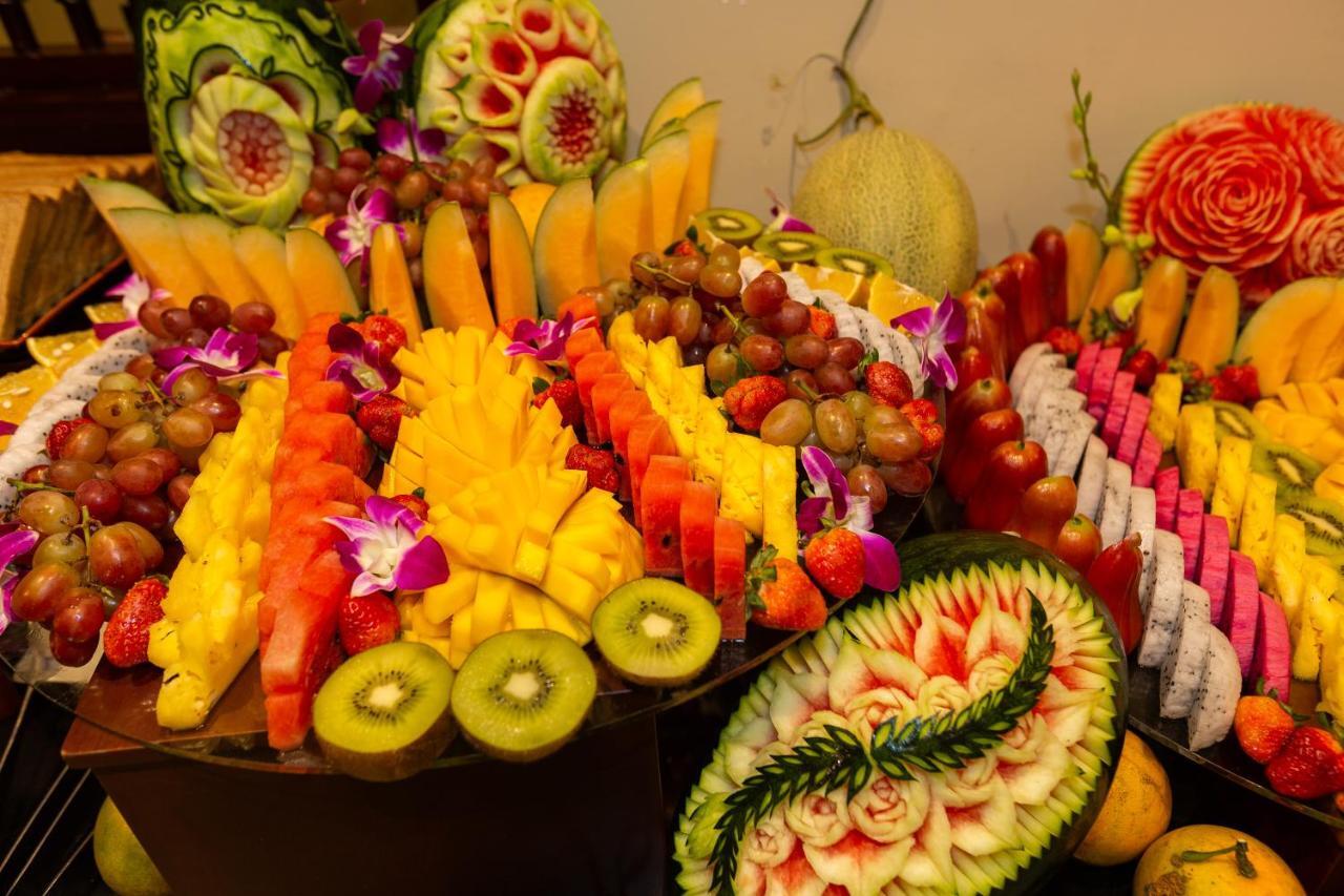 Cozy Savvy Boutique Hotel Hoi An Eksteriør billede Fruit carving